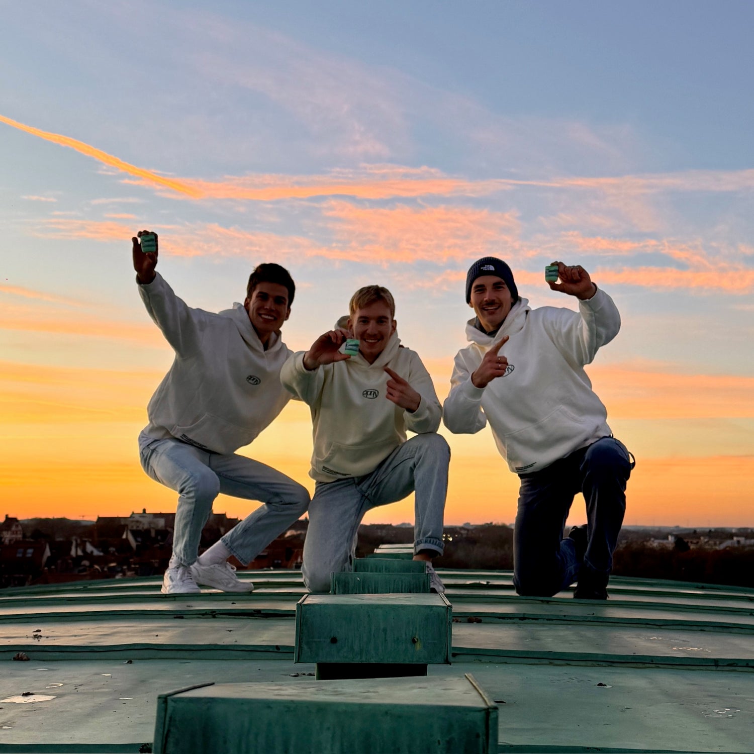 Founders of Sneef holding a herbal inhaler